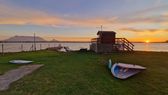 Evening at Rietvlei: wing and board on the Milnerton Aquatic Club lawn, Table Mountain behind