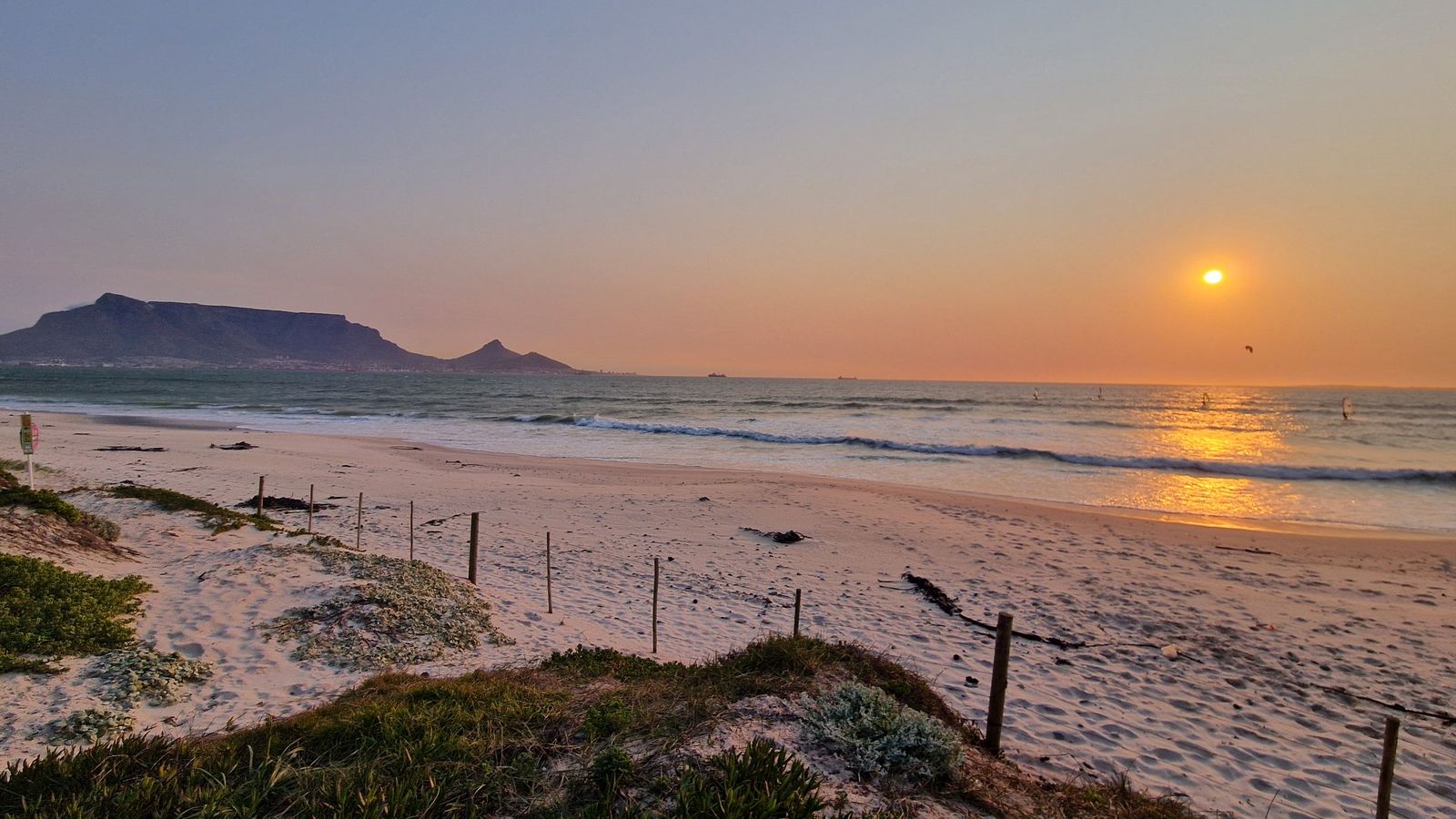 Sunset at Sunset Beach looking towards Table Mountain and Lion's Head